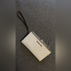 Micheal Kors wristlet with phone holder